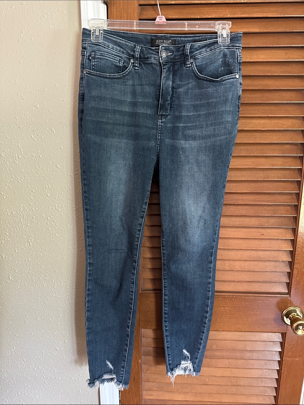 Judy Blue Women's High-Rise Dark Wash Skinny Jeans with distressed hem